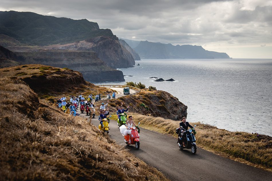 Photo taken of a bridal party on their Vespa scooters on the curvy roads of Madeira Island